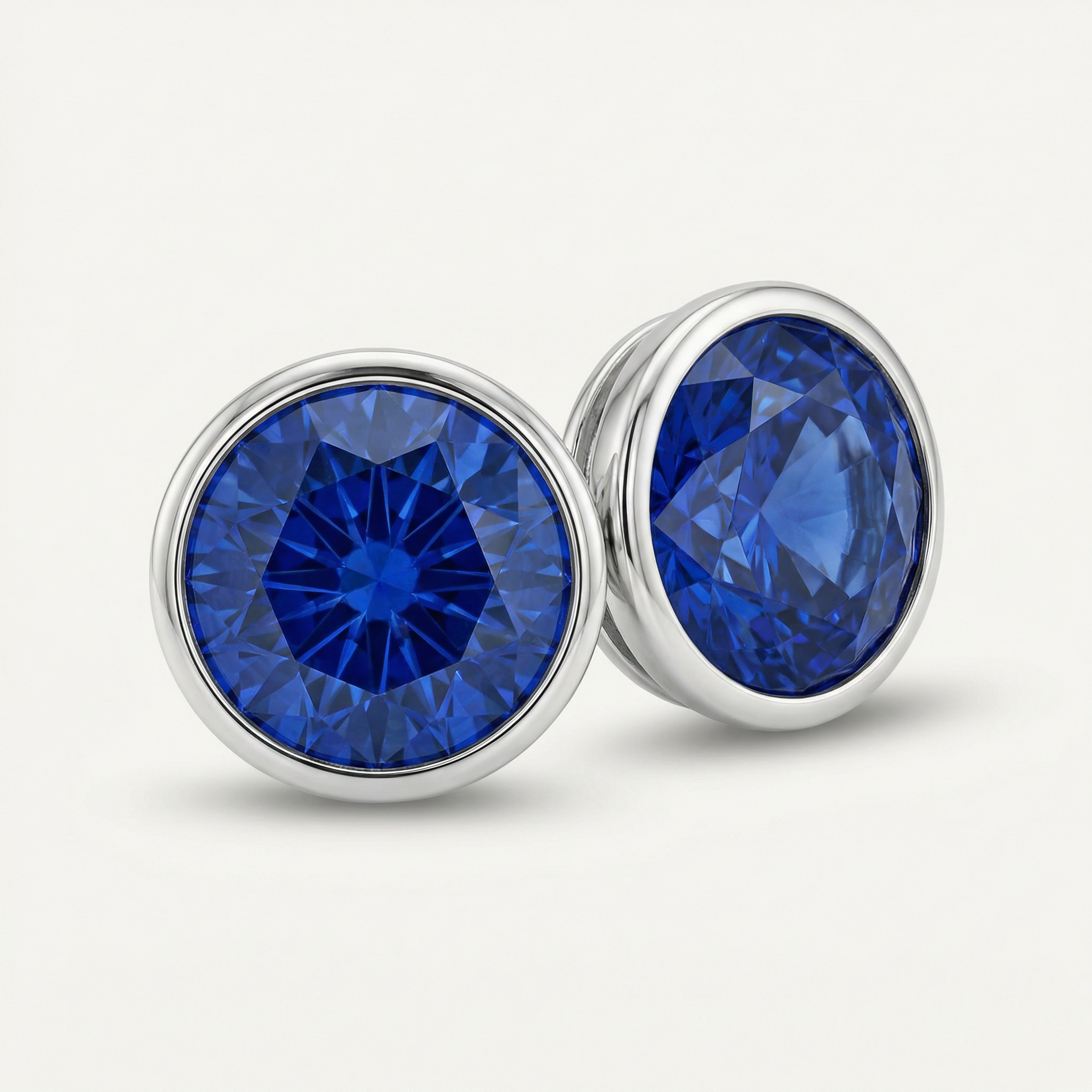 1CT BRILLIANT CUT BEZEL EARRINGS-BLUE SAPPHIRE