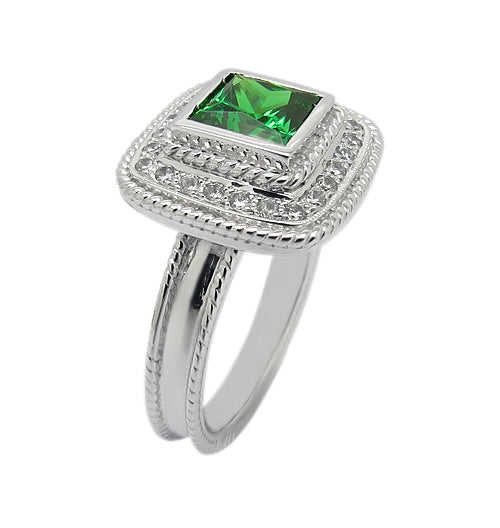 PRINCESS CUT EMERALD BEZEL SET WITH ROUNDED SMALL BRILLIANTS