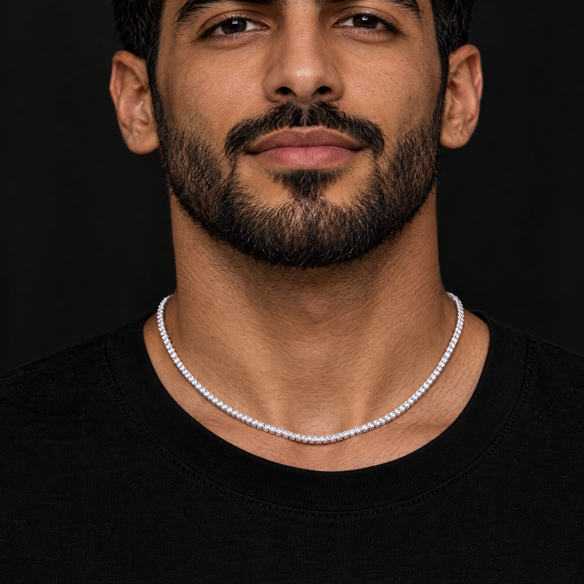 Men's 2MM Moissanite Tennis Necklace in silver worn by an Arab male model